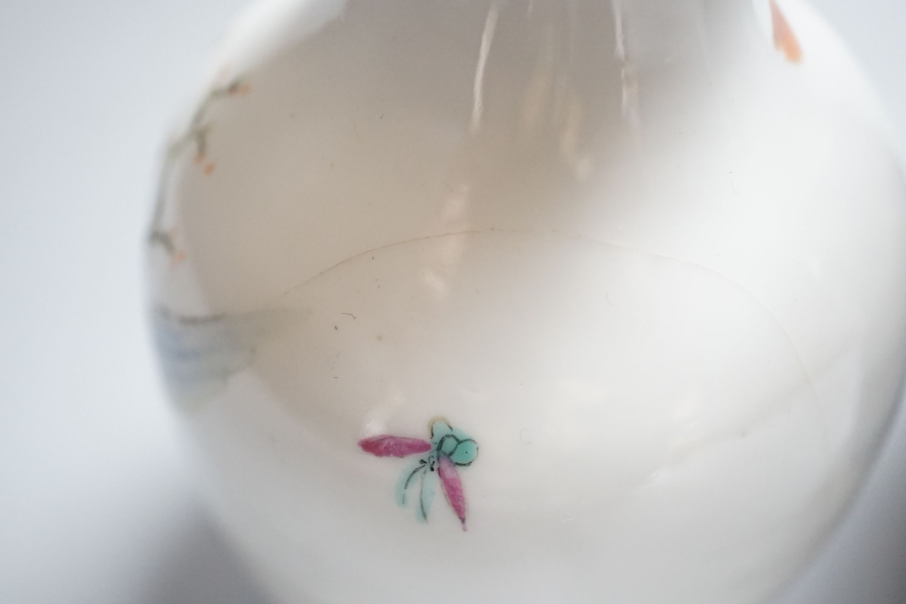 A Chinese blue and white sleeve vase and small famille rose vase, sleeve vase 25 cms high.